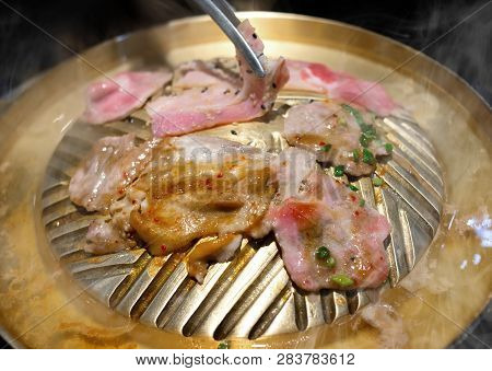 Slice Pork Grilled Bbq On Iron Pan.