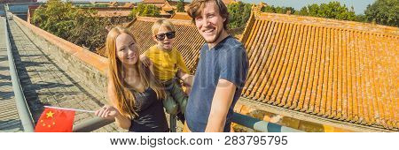 Enjoying Vacation In China. Happy Family With National Chinese Flag In Forbidden City. Travel To Chi