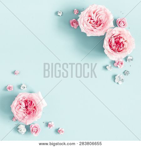 Flowers Composition. Frame Made Of Rose Flowers On Pastel Blue Background. Valentines Day, Mothers D