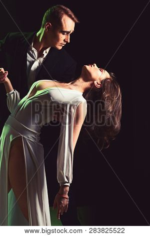 Focusing On The Love Affair. Couple Of Mime Artists Perform Romance On Stage. Theatre Actors Miming 