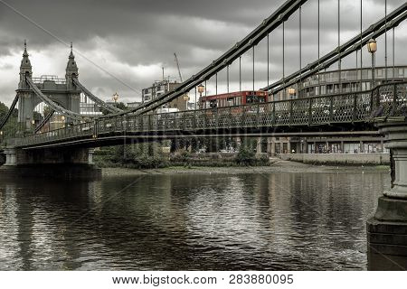 London, England - May 30: Hammersmith Bridge Crosses The River Thames In West London In On May 30, 2