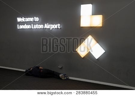 London, England - Jun 1: Man Sleeping In Front Of Departure Hall  After Canceled Flight At Airport L