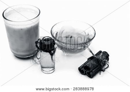 Close Up Of Popular Indian & Asian Winter Drink Isolated On White I.e Honey Milk Or Shahad Ka Dudh I
