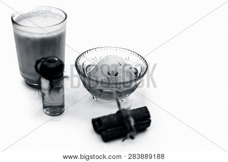 Close Up Of Popular Indian & Asian Winter Drink Isolated On White I.e Honey Milk Or Shahad Ka Dudh I
