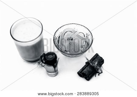 Close Up Of Popular Indian & Asian Winter Drink Isolated On White I.e Honey Milk Or Shahad Ka Dudh I