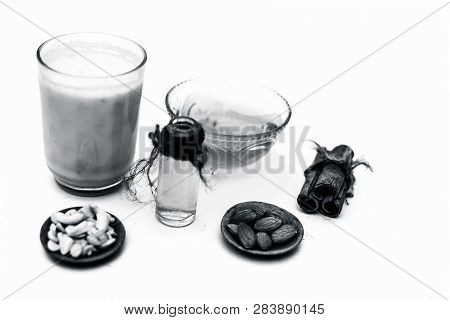 Close Up Of Popular Indian & Asian Winter Drink Isolated On White I.e Honey Milk Or Shahad Ka Dudh I