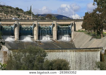 Water Falling Over Spillway On Germasogeia Dam, Limassol, Cyprus After The Heavy Winter Rains