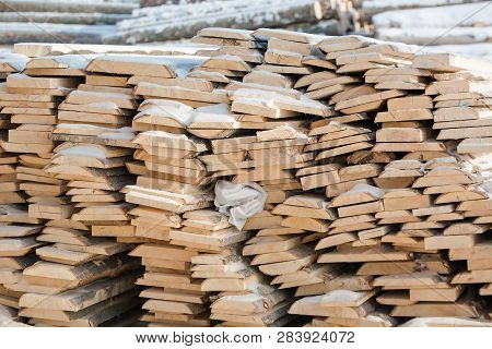 Logs Sawn On The Boards. Sawing Boards. A Lot Of Lumber.