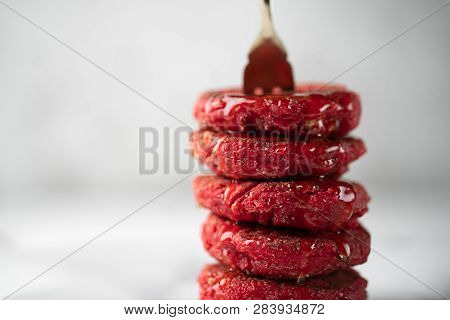 Close Up Of Heesecakes With Honey Colored In Red.russian Traditional Breakfast.food Consept.plate Wi