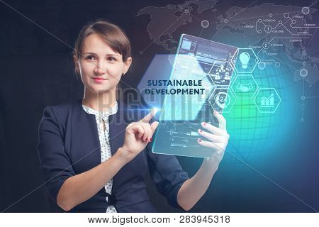 The Concept Of Business, Technology, The Internet And The Network. A Young Entrepreneur Working On A