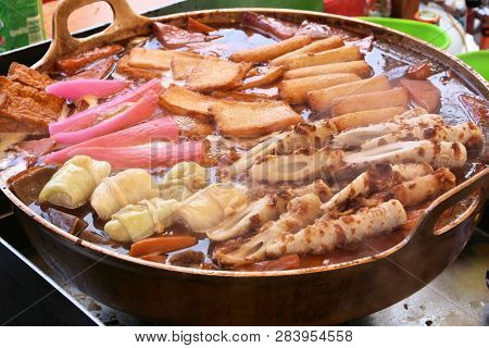 Japan Cuisine - Oden Food In Soy Broth. Typical Japanese Winter Dish With Tofu, Dumplings And Daikon
