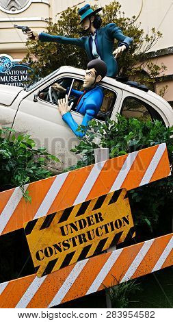 Osaka, Japan - Feb 11 2019 : Lupin The 3rd Car Chase Xr Ride At The Entrance Of Lupin And  Jigen Fig