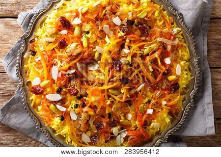 Persian Delicious Pilaf Javaher Polow (jeweled Rice) Closeup On A Plate On The Table. Horizontal Top