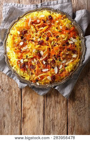 Javaher Polow (jeweled Rice) Is A Traditional Persian Rice Dish Closeup On A Plate. Vertical Top Vie