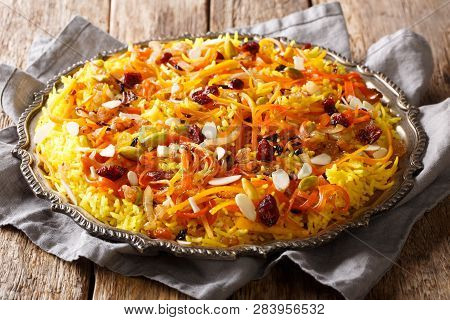 Iranian Wedding Pilaf Javaher Polow Or Jeweled Rice Close-up On A Plate. Horizontal