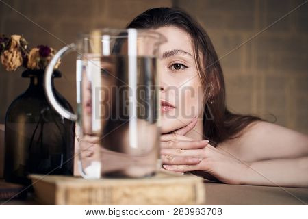 Beauty Portrait Of Girl With Water And Reflections. Hight Quality Retouching Photo. Fashion Model.