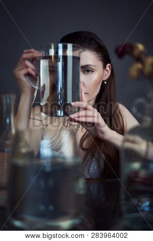 Beauty Portrait Of Girl With Water And Reflections. Hight Quality Retouching Photo. Fashion Model.