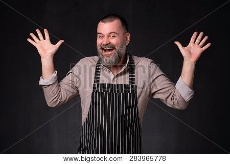 Senior Shocked Shopman Man, Looking At Camera With Wide Opened Mouth Shouting.