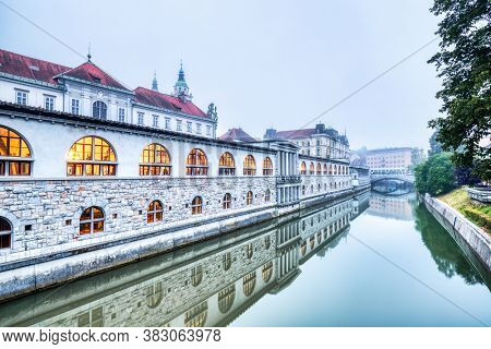 Ljubljana City Center Lublanka River Covered By Mist Overlooking , Slovenia