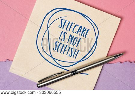 selfcare is not selfish inspirational reminder - handwriting and doodle on a napkin, body positive, mental health slogan