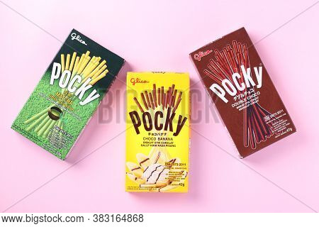 Pocky Brand With Banana, Chocolate And Matcha Sticks On Pink Background, Famous Confectionery Among 
