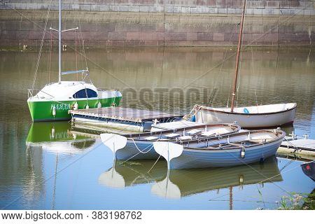 Astrakhan, Russia - 08.12.2020: Sailboats Are Tethered At The Pier On The Kutum River