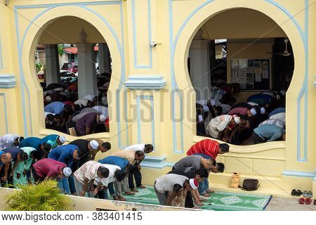 George Town, Penang/malaysia - Jul 19 2018: Acheh Mosque With Muslim Praying.