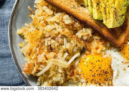 Homemade Fried Shredded Hashbrowns And Eggs