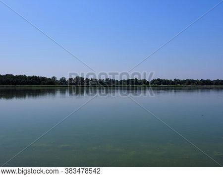 Desolate Artificial Pond In European Goczalkowice Town At Silesian District In Poland, Clear Blue Sk