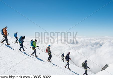 Cervinia, Italy - July 18, 2020: Mountaineers Ascending And Tackling Slopes Of Breithorn - Considere