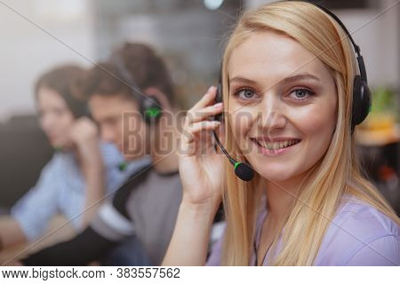 Cheerful Call Center Operator At Work