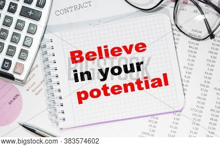 Business Concept. Notebook With Text Believe In Your Potential Heet Of White Paper For Notes, Calcul