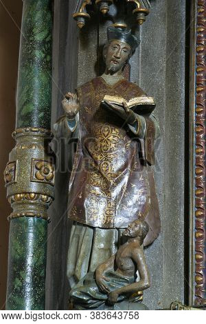 GORNJI MIKLOUS, CROATIA - SEPTEMBER 26, 2011: St. Benedict statue on St. Lawrence Altar at St. Nicholas Church in Gornji Miklous, Croatia