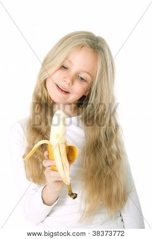 fiatal szőke lány gazdaság banán