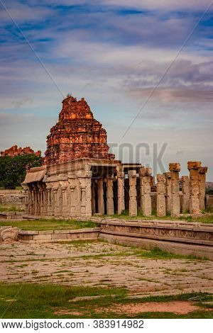 Vithala Temple Hampi Ruins Antique Stone Art From Unique Angle With Amazing Sky