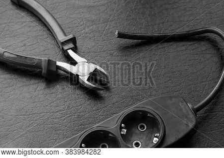 Cut Wire Of Electrical Splitter And Side Cutters. Electrical Safety Concept. Selective Focus. Monoch
