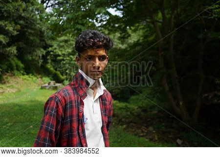 Almora, India - September 06, 2020: Portrait Of A Pahadi Boy With Tilak On His Forehead. Fun And Hap