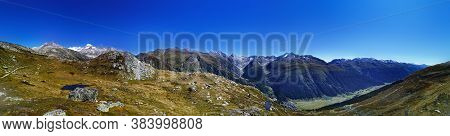 Panorama Scenery Of The Swiss Alps. Lake At The Top Of Grimsel P