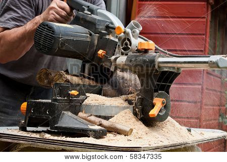 Circular saw cutting wood