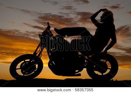 Silhouette Of Woman On Motorcycle Hand Hair Leg Up