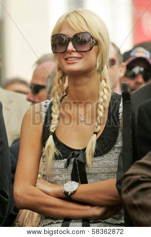 Paris Hilton at the Ceremony Honoring Los Angeles Lakers Owner Jerry Buss with the 2,323rd star on the Hollywood Walk of Fame. Hollywood Boulevard, Hollywood, CA. 10-30-06