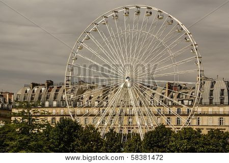 Ferris Wheel (roue De Paris) On The Place De La Concorde From Tuileries Garden. Ferris Wheel Was Ins