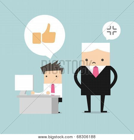 Salary man play social network and boss stand behind him