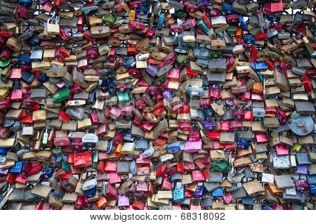 COLOGNE, GERMANY - MAY 29, 2014, Thousands of love locks which sweethearts lock to the Hohenzollern Bridge to symbolize their love on May 29 in Koln, Germany 