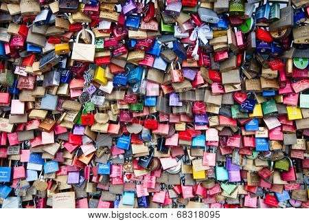 COLOGNE, GERMANY - MAY 29, 2014, Thousands of love locks which sweethearts lock to the Hohenzollern Bridge to symbolize their love on May 29 in Koln, Germany 