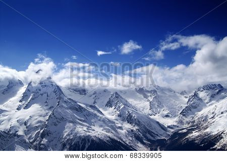 Snowy Mountains At Sun Day