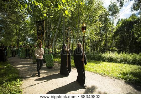 KRASNY BRONEVIK, RUSSIA - JULY 7, 2014: Celebrations commemorating the Rev. Anthony Dymsky (died 1224) in Antony Dymsky Monastery - Procession on Lake Dymsky, the great blessing of water and bathing.