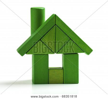 Green House, Energy Efficiency Home Save Heat And Ecology. Toy Blocks Isolated White Background
