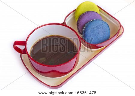 Red Cup Of Coffee And Colorful Biscuit Isolated On White Background