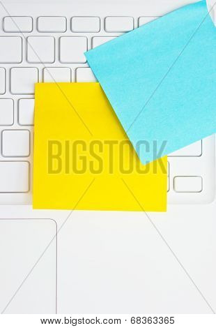 Colorful Sticky Notes Post On White  Laptop's Keyboard